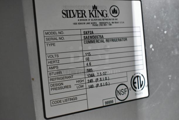 Silver King SKF2A commercial prep table label, showing model, 115 volts, refrigerant details, NSF and ETL certifications.