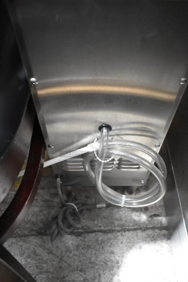 SureShot ACFS-10 stainless steel flavor dispenser. Countertop design, 120 volts, 1 phase. Includes tubing. Good condition.