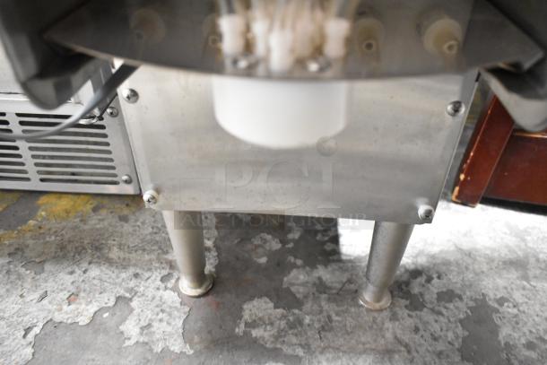 SureShot ACFS-10 Stainless Steel Commercial Flavor Dispenser, countertop design, 120 volts, 1 phase, sturdy legs, used condition.