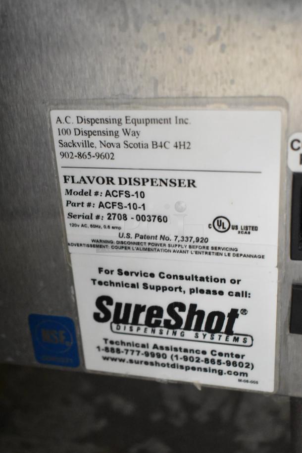 SureShot ACFS-10 stainless steel commercial flavor dispenser, 120V, 1 phase. Manufacturer label with model, serial number visible.