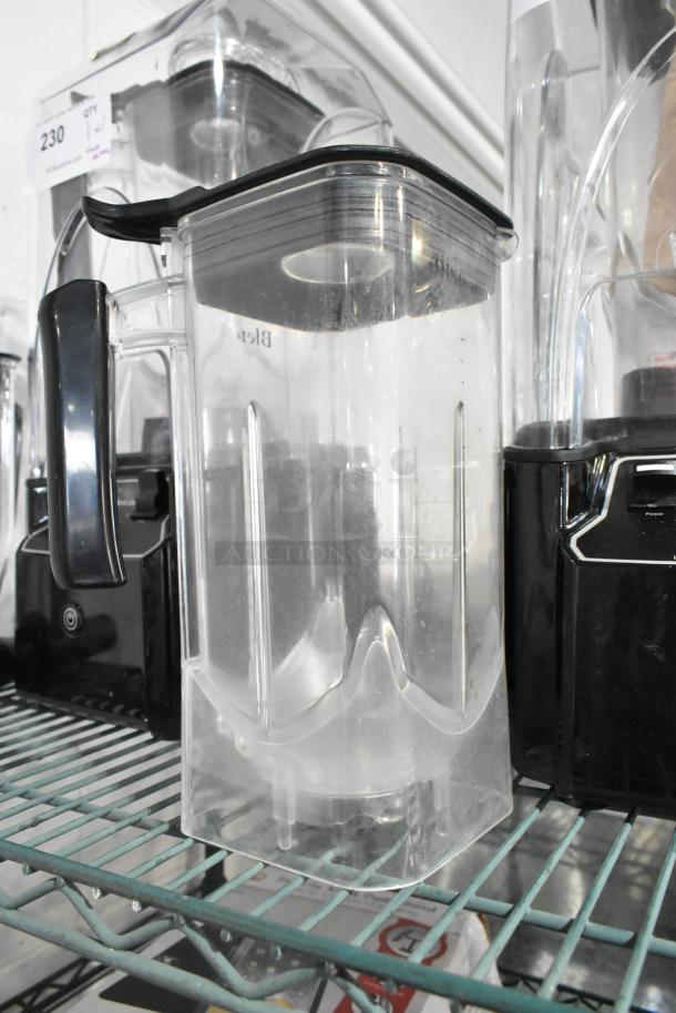 Cranddi K90 blender base with pitcher and enclosure cover on shelf, 110V, 1 phase. Clear pitcher, black handle.