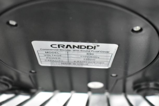 Cranddi K90 blender base with label showing model, voltage 110V/60Hz, and power 2200W.