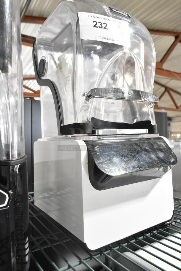 Wantjoin WX-9003 countertop blender with pitcher and enclosure. Model WX-9003, 110 volts, single phase. Auction item label visible.