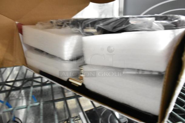 Brand new CTA Security Kiosk Dual Stand in original packaging with visible foam protection. Minor scratches and dents.