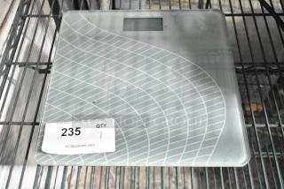 Smart Heart 19-103 Scale, glass surface with geometric design, digital display. Auction label shows item number 235.