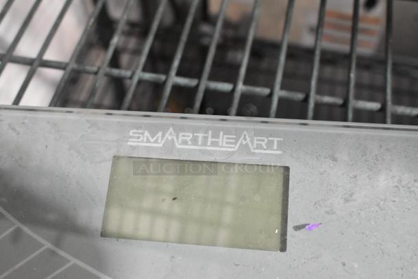 Smart Heart 19-103 digital scale, visible logo, gray surface, slightly dusty, LCD display, good condition.