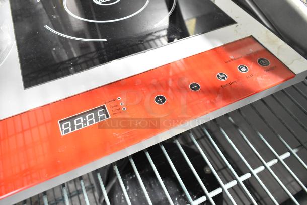2018 Avantco IC18DB Stainless Steel Induction Range with two burners, digital display, and control buttons. Good condition.