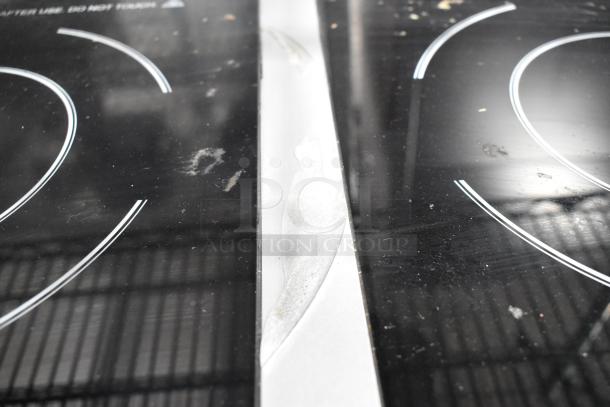 2018 Avantco IC18DB stainless steel commercial countertop 2 burner induction range; visible wear; 120 volts, 1 phase.