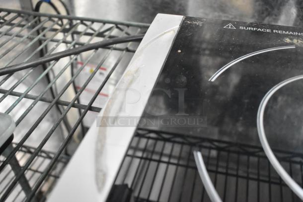 2018 Avantco IC18DB stainless steel induction range, 2 burners, commercial countertop, some surface wear. 120V, 1 Phase.