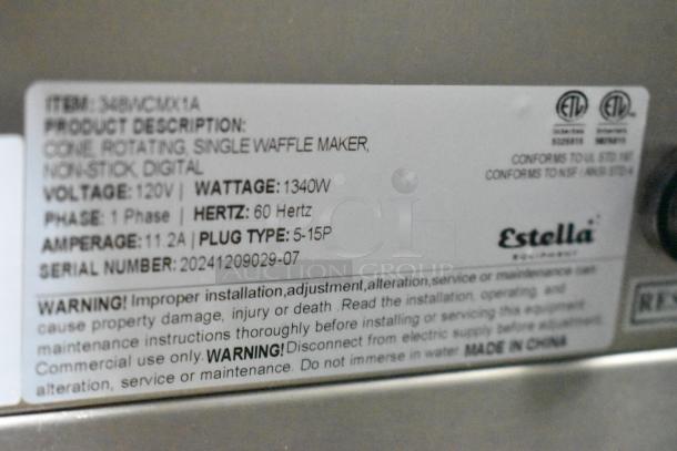 2024 Estella 348WCMX1A stainless steel commercial countertop cone rotating waffle maker; 120V, 1 phase. Tags show specs and safety info.