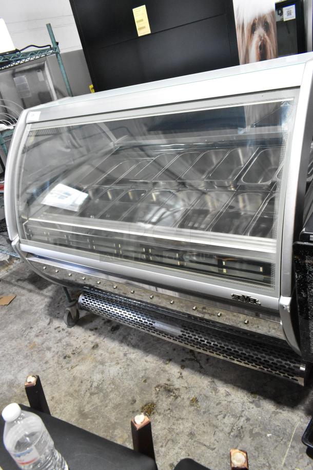 Sevel Metal Gelato Case Merchandiser, stainless steel bins, 208V, 1 phase, commercial floor style, excellent condition.