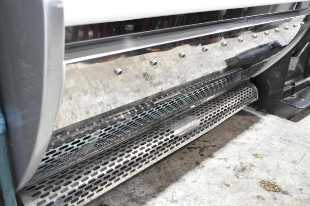 Sevel metal gelato case with stainless steel drop-in bins, 208V, 1-phase. Commercial floor style, visible perforated design.