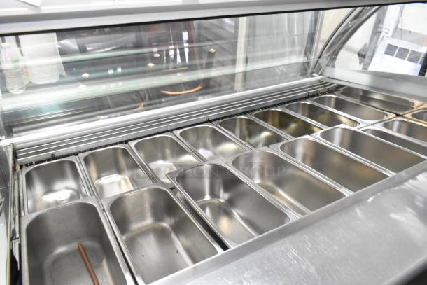 Sevel Metal Gelato Case Merchandiser with stainless steel 1/3 size drop-in bins, 208V, 1 phase, commercial floor style.