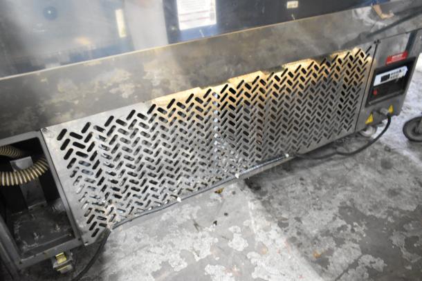 Sevel Metal Gelato Case Merchandiser; stainless steel, floor style, with 1/3 size drop-in bins. 208V, 1 Phase. Used condition.