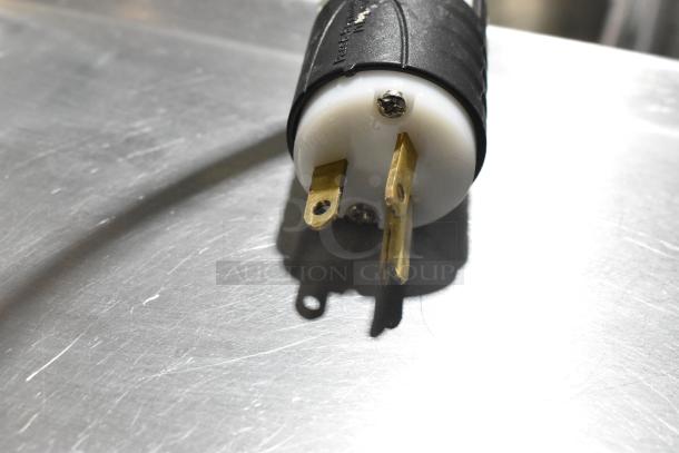 Power plug of Sevel Metal Gelato Case Merchandiser, 208 volts, 1 phase. Rugged metal housing, suitable for commercial use.