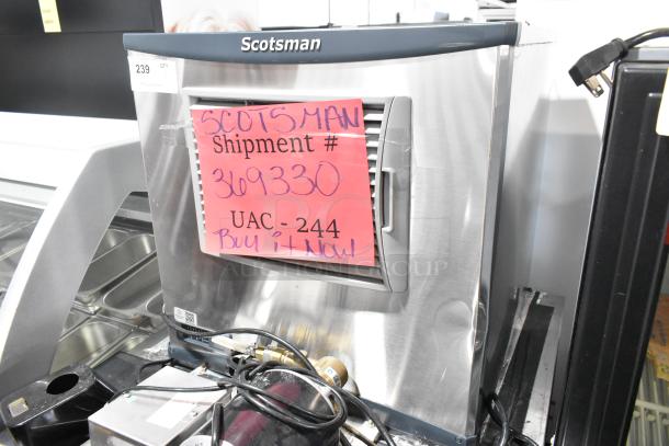 Stainless steel Scotsman NH0622A-1B ice head on 2022 Lancer TP30 beverage dispenser. Note visible damage. 115V, 1Phase.