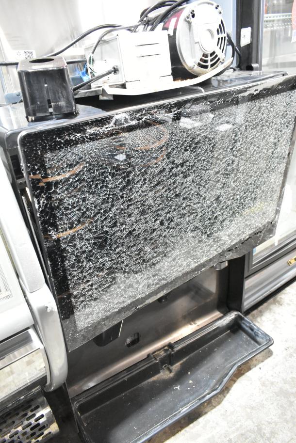 Scotsman NH0622A-1B ice head on Lancer TP30 beverage dispenser with visible damage to the exterior. 115V, 1Phase.