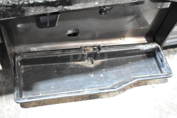 Scotsman NH0622A-1B ice head on Lancer TP30 dispenser. Stainless steel, 115V, 1Phase. Visible surface damage shown.