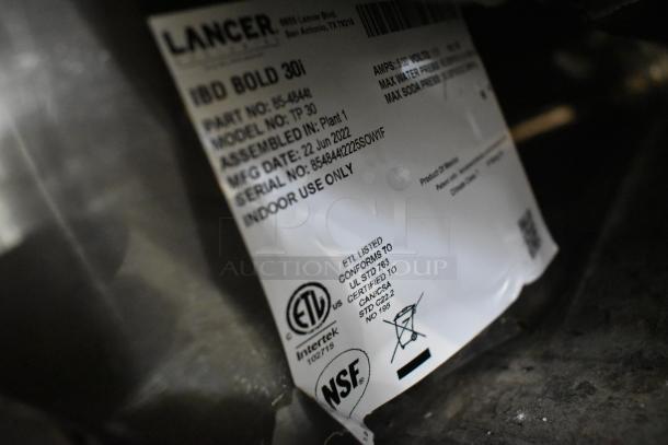 Label close-up of Lancer TP30 Beverage Dispenser, model TP30, part no. 85-4441, manufactured June 22, 2022.