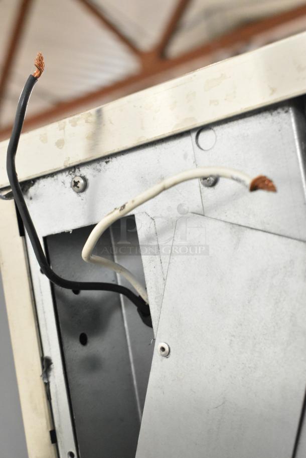 Scotsman NH0622A-1B ice head on 2022 Lancer TP30 dispenser, 115V, 1Phase. Image shows exposed wiring indicating possible damage.