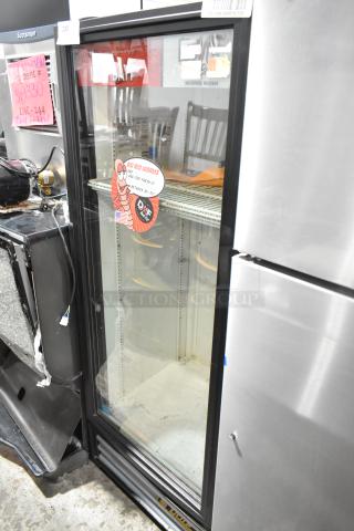 True GDM-12-LD metal single door cooler merchandiser with poly coated racks, visible sticker, used condition.