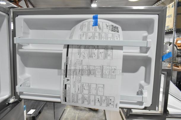 BRAND NEW SCRATCH AND DENT! 2025 Whirlpool 21MSTFATR6 stainless steel cooler with freezer, 115V, 1 phase. Inner label with setup instructions.