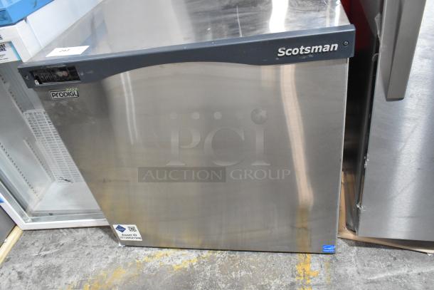 Scotsman Prodigy C1030MA-32B stainless steel ice head, 208/230 volts, 1 phase, asset ID tag visible, commercial model.