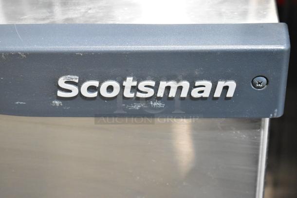 Scotsman Prodigy C1030MA-32B stainless steel commercial ice head, features branding, operates on 208/230 volts, 1 phase.