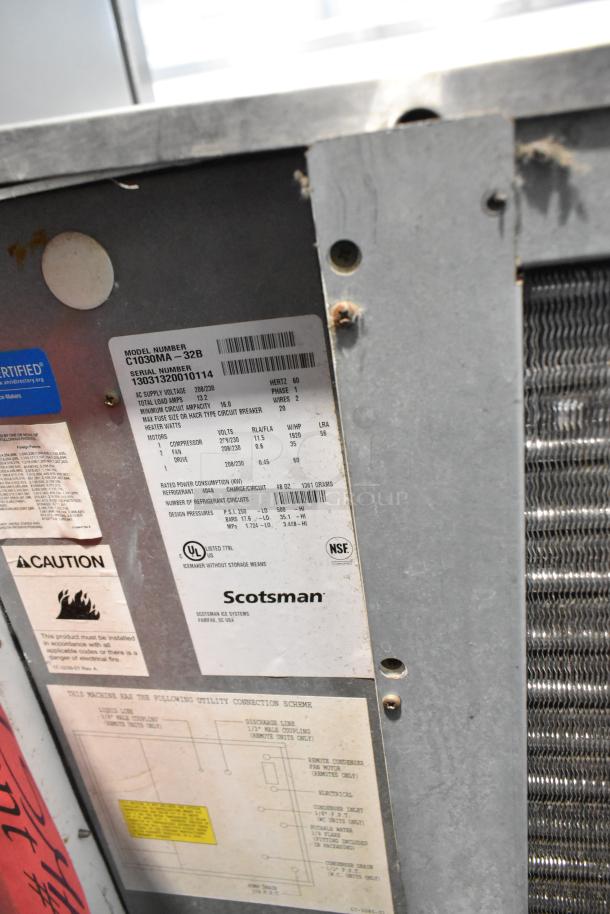Scotsman Prodigy C1030MA-32B stainless steel commercial ice head. Info tags: model, voltage, certifications. 208/230V, 1 phase.