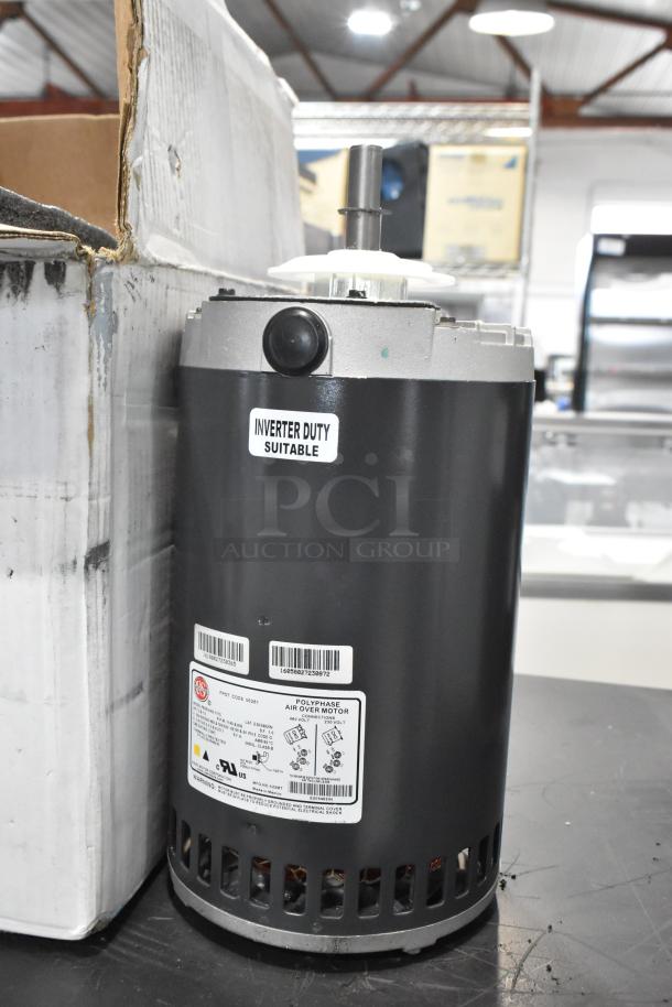 2 Hussmann P63SYAAD-1115 fan condenser motors, 208-230/380-460V, 3-phase. Inverter duty suitable. Labels visible.