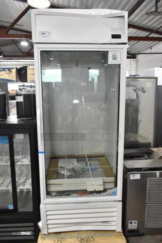 True TSCI-600R-G-PH commercial cooler, single glass door, poly coated racks, 115V, brand new with minor dents.