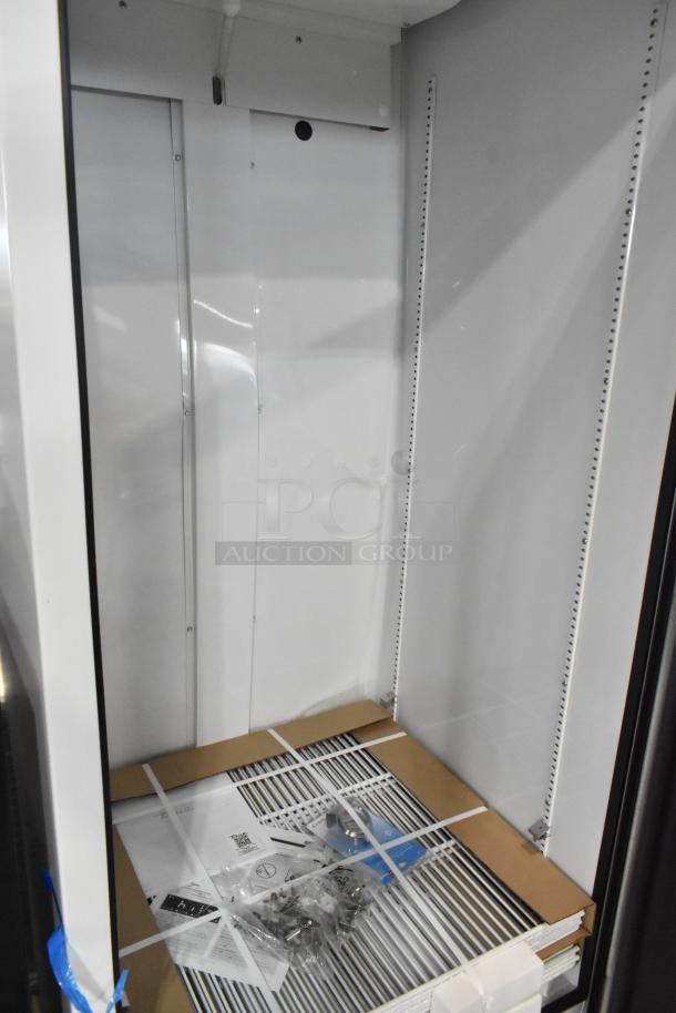 Brand new True TSCI-600R-G-PH commercial cooler, single door, reach-in, with poly-coated racks, 115 volts, 1 phase.