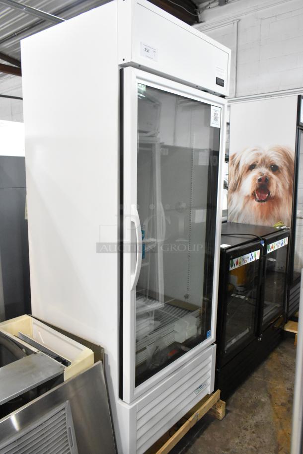 Brand new True TSCI-600R-G-PH commercial single door reach-in cooler with poly coated racks, 115 Volts, 1 Phase, scratch and dent.