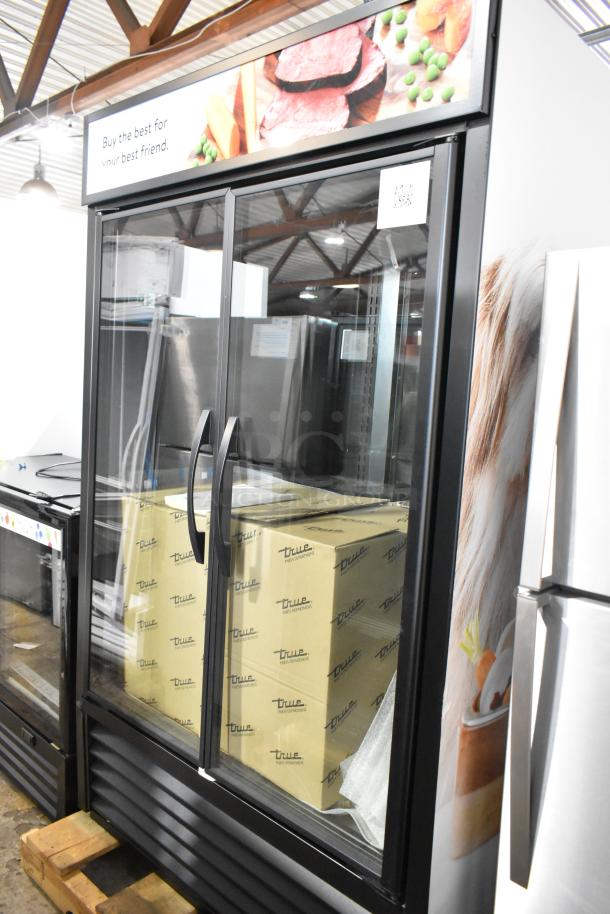 2025 True TVM-48SL-HC metal commercial 2 door cooler merchandiser, 115V, 1 phase, excellent condition with glass doors.