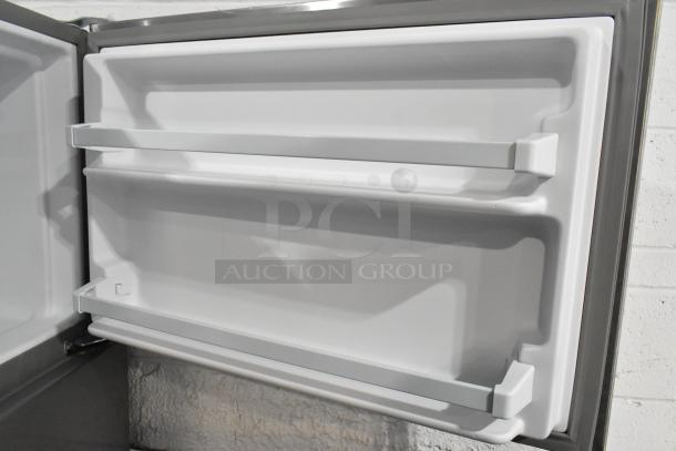 BRAND NEW Whirlpool WRT311FZDM05 stainless steel fridge, scratch and dent. Freezer compartment, dual shelving. 115V, 1 Phase.