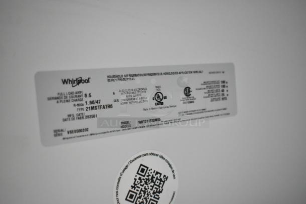 Label on Whirlpool WRT311FZDM05 cooler, showing model and serial number. 115V, 1 phase. Scratch and dent condition.