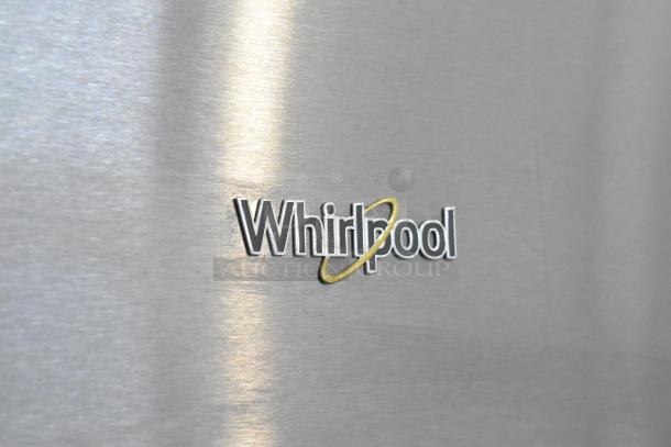 Whirlpool WRT311FZDM05 logo on stainless steel surface, highlighting brand authenticity.