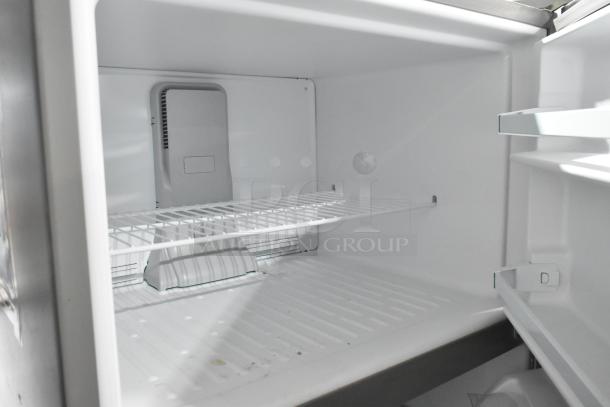 Brand new Whirlpool WRT311FZDM05 stainless steel cooler with freezer, 115V, 1 phase. Scratch and dent condition.
