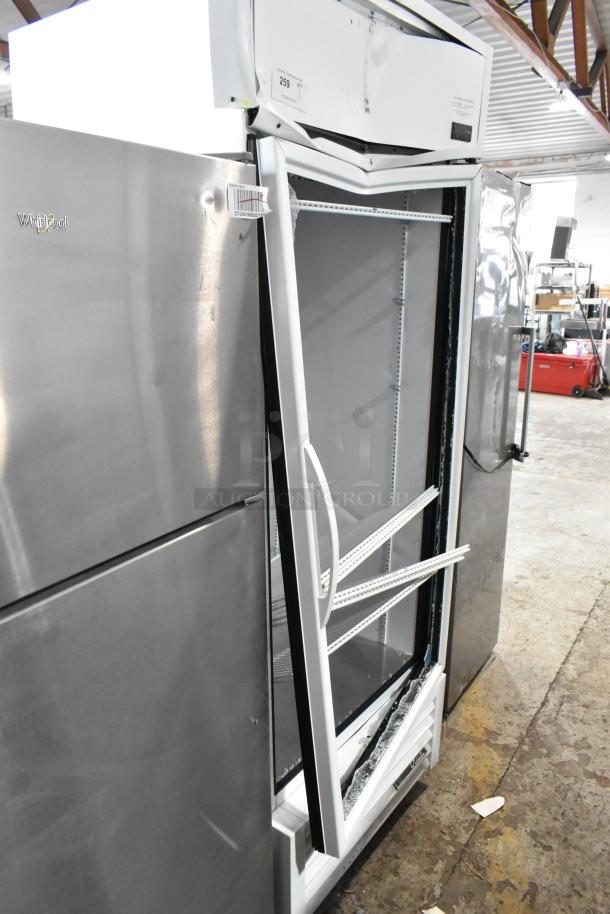 2021 True TSCI-600R-G-PH metal commercial reach-in cooler, damaged glass door, 115 volts, 1 phase, visible dents.