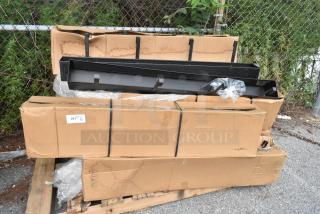 11 new scratch and dent items, including condiment rack model 6001021419100U0015, boxed and on wooden pallet.