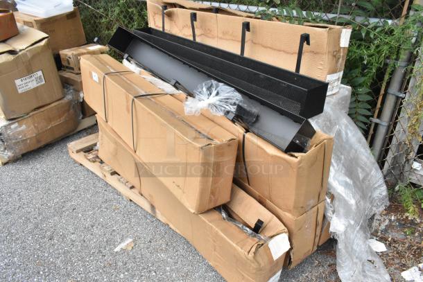 11 new scratch-and-dent items on a pallet, including a condiment rack. Labels indicate shipping details.