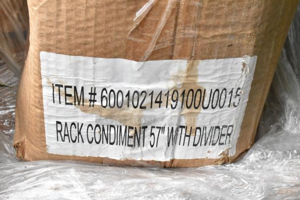 Brown cardboard box with label reading "Item #6001021419100U0015, Rack Condiment 57" With Divider." Box is partially damaged.
