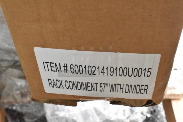 Cardboard box with label showing "Item #6001021419100U0015, Rack Condiment 57" with Divider". New scratch and dent condition.