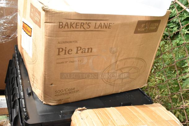 Box containing Baker's Lane aluminum foil pie pans, 9 inch wide and 1 1/4 inch deep, 500 per case, new condition.