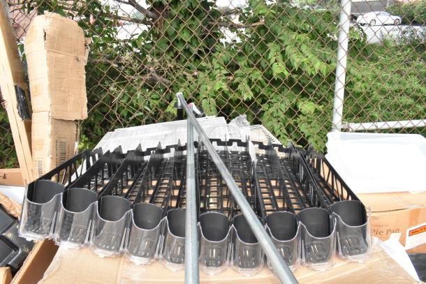8 new scratch and dent items including Steelton 18"x36" underbar ice bin with bottle holders, 10 Lane bottle organizer.