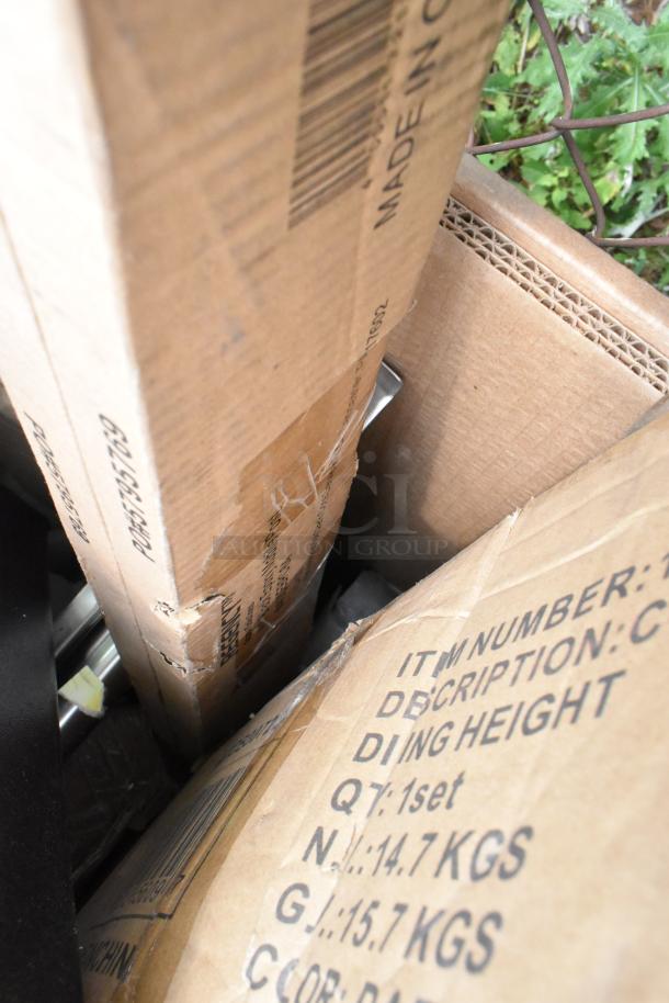 Boxes containing 14 brand new scratch and dent items, including Lavex mop bucket and sink, showing labels and weights.