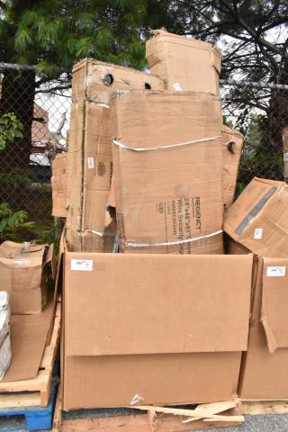 Stack of new scratch and dent items in torn boxes; visible Regency NSF Chrome Wire Cage label, item code #460ECSC2448.