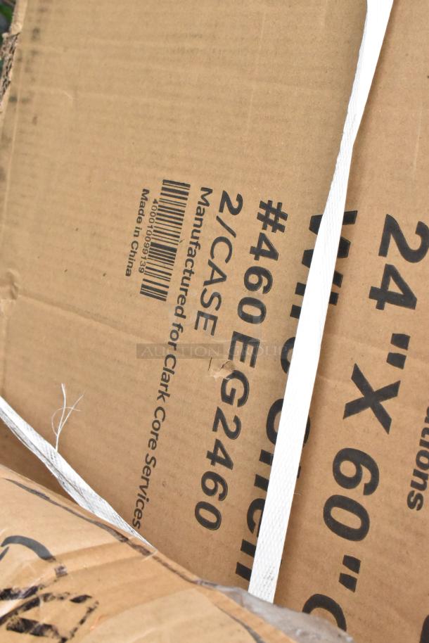 Cardboard box labeled "#460EG2460, 24" x 60", manufactured for Clark Core Services." Contains scratch and dent items.