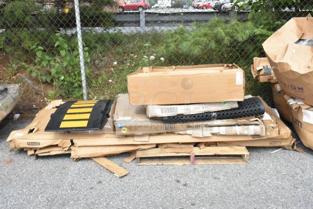 Boxes of new scratch and dent items, including a Lancaster Table & Seating 30" round table and folding table dolly.