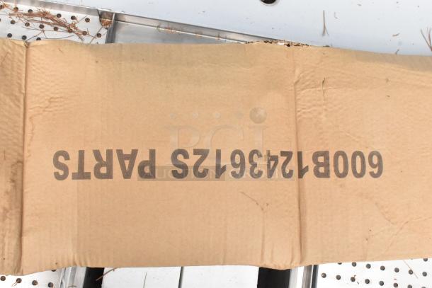 Cardboard box labeled "600B1243612S PARTS" for Regency Spec Line underbar sink.